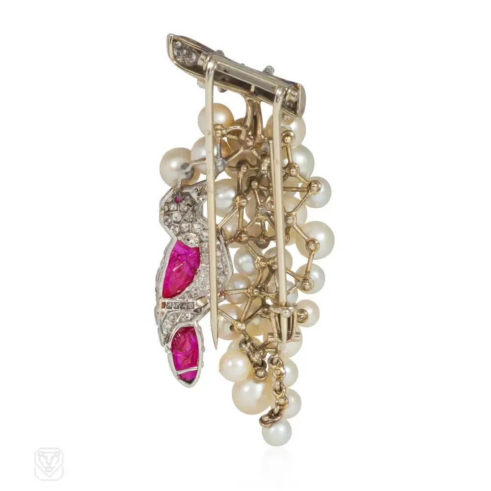 Sure, heres an optimized title for the product:
Stunning 1930s J.E. Caldwell Ruby, Diamond, and Pearl Grape Cluster Brooch