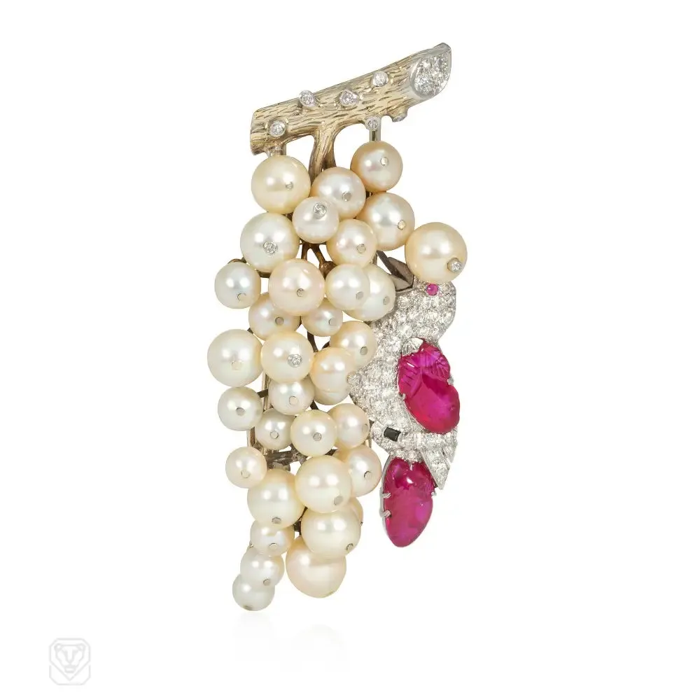 Sure, heres an optimized title for the product:
Stunning 1930s J.E. Caldwell Ruby, Diamond, and Pearl Grape Cluster Brooch