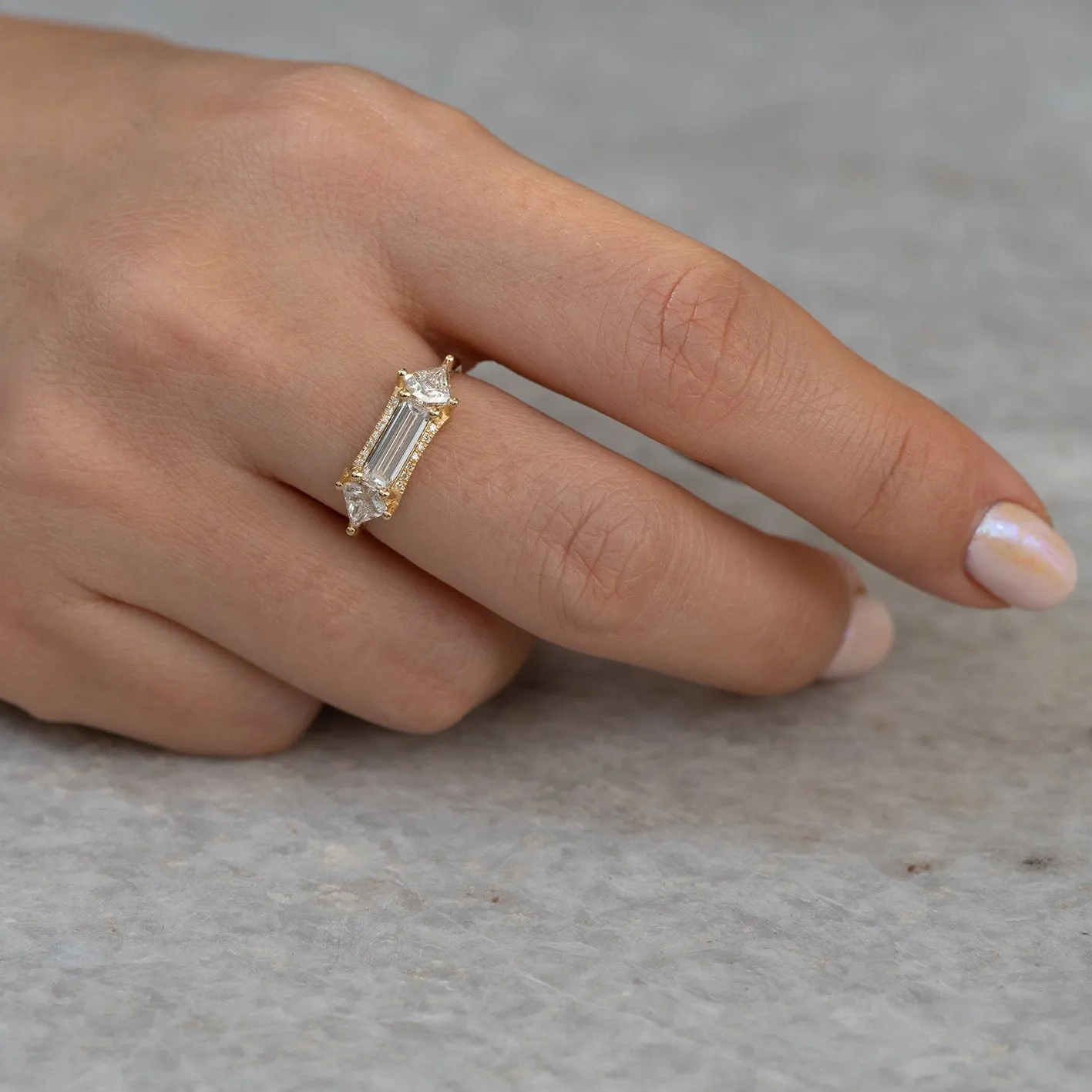 Baguette cut engagement  ring with kite diamonds
