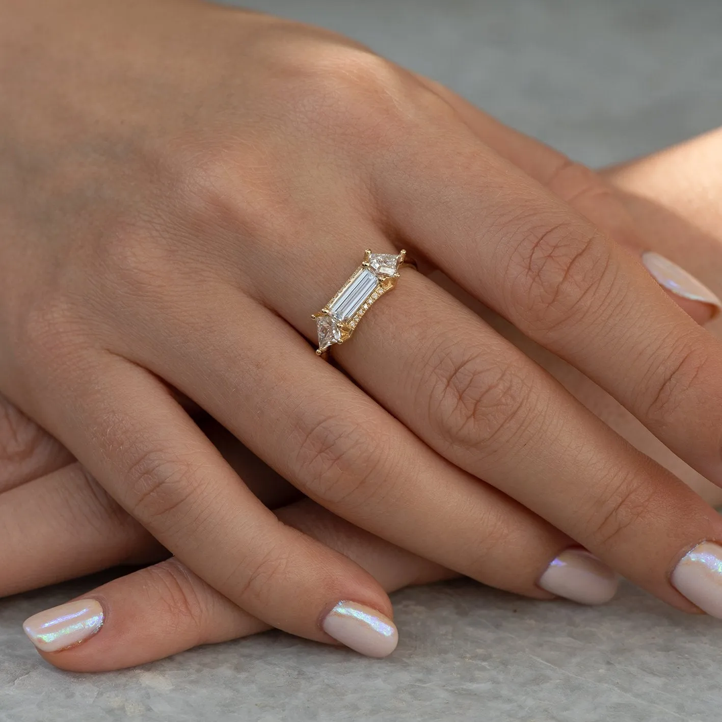 Baguette cut engagement  ring with kite diamonds